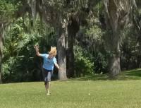 Lisa, turning cartwheels at Bok Tower, Florida.